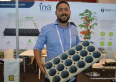 Konstantinos Tsonakis shows the blueberry tray from INA Plastics.